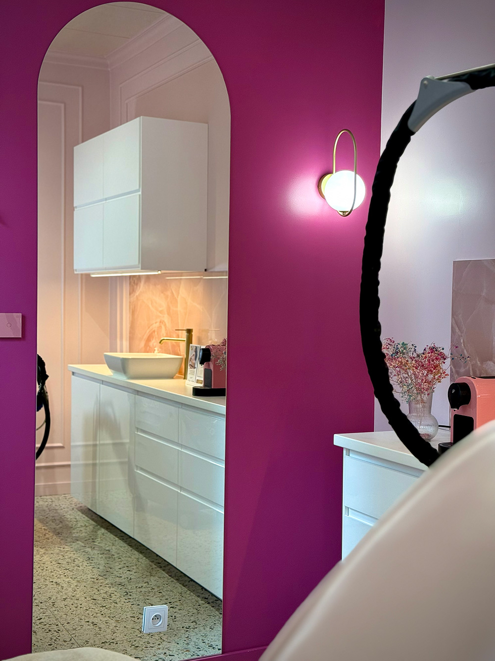 Professional aesthetician performing laser treatment